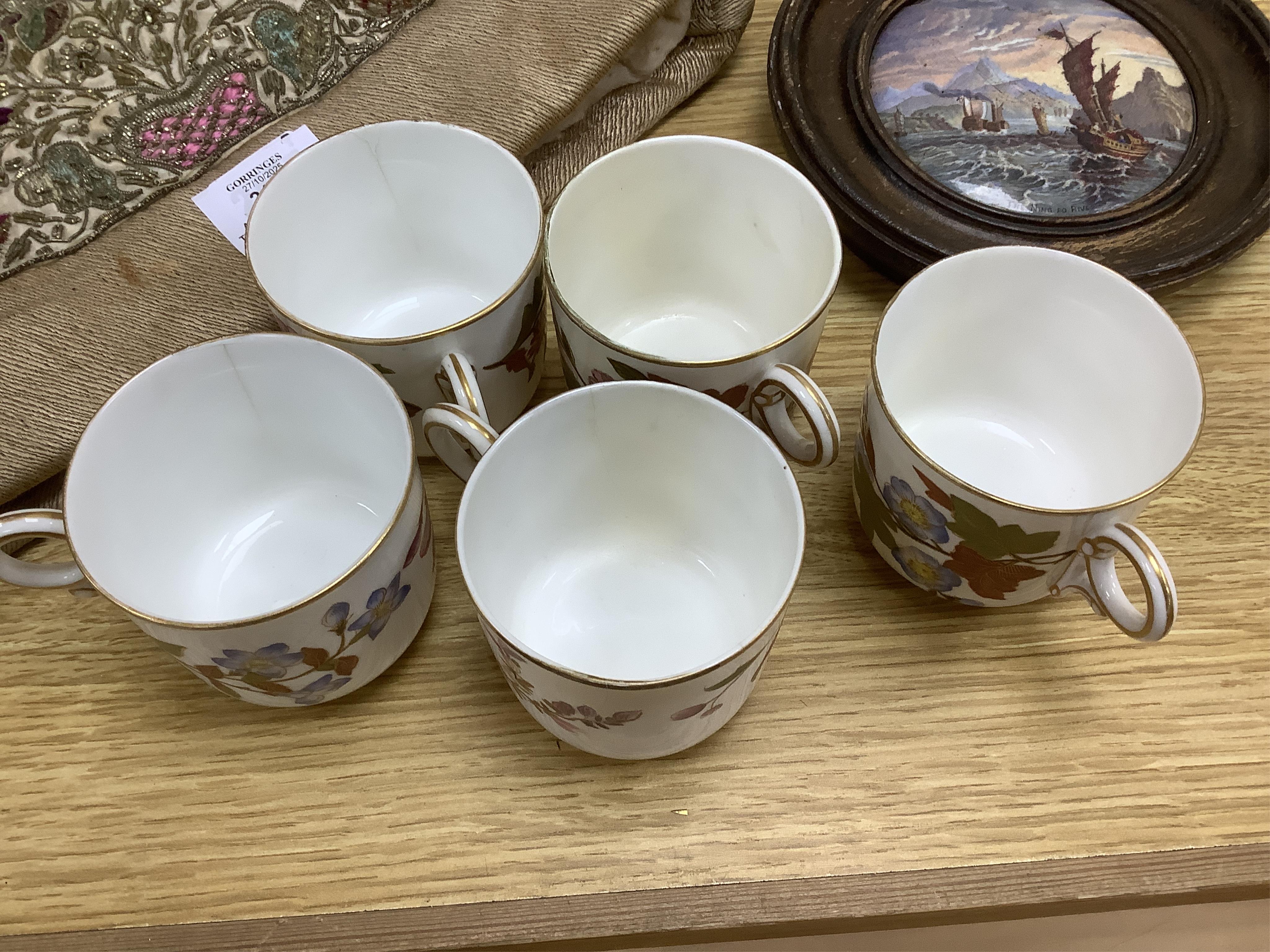 A late Victorian Royal Worcester floral decorated tea service, milk jug 13cm high.